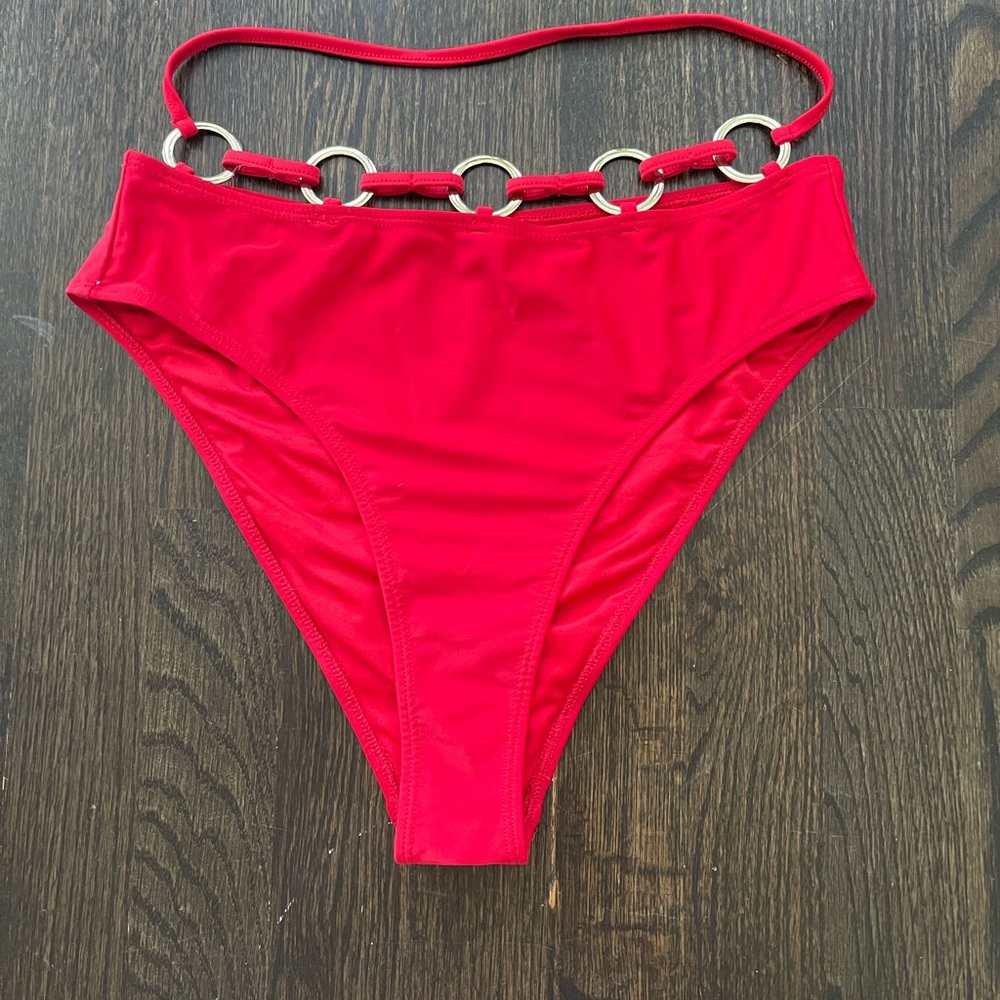 Red high waist rave bottoms with gold ring detail